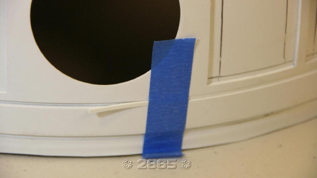 The styrene strip is placed between the ring and the bottom edge of the outer dome, snugged up and then taped in place.